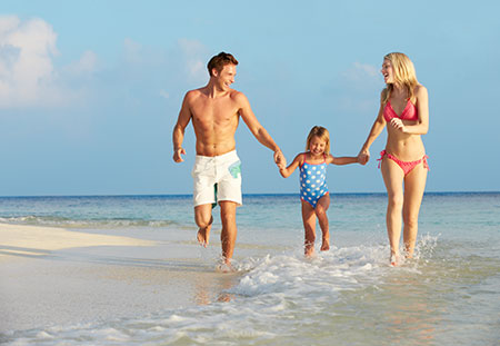 Fotografía familia en una playa